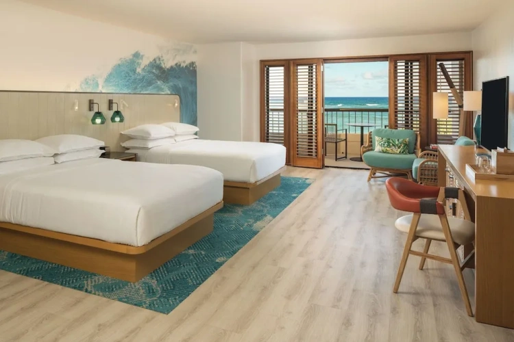 Deluxe Quadruple room with balcony and oceanfront