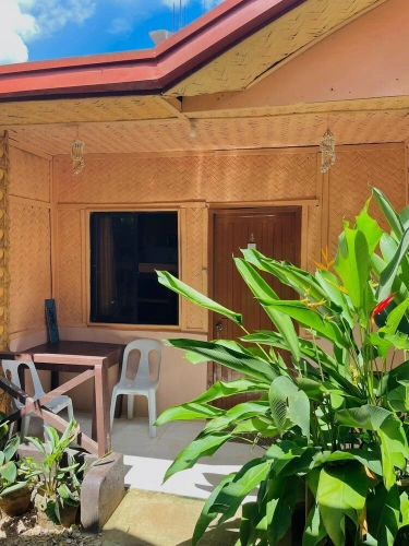 Standard Triple room with garden view