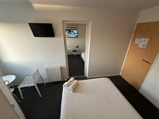 Standard Quadruple room with city view