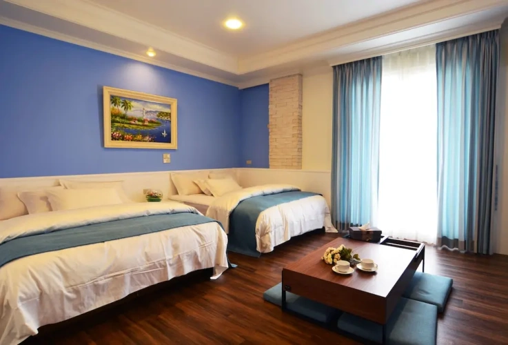 Deluxe Quadruple room with balcony