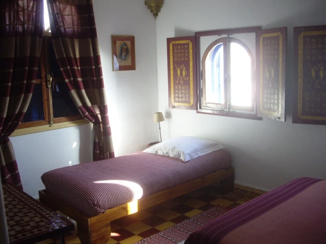 Standard Triple room with partial sea view