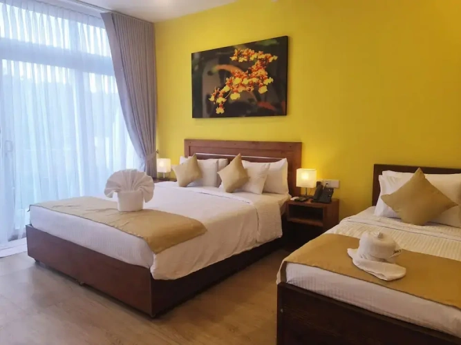 Deluxe Triple room with balcony and with mountain view