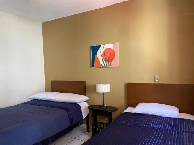 Standard Quadruple room with garden view