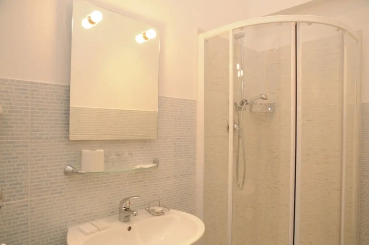 Comfort Quadruple room with balcony and with city view
