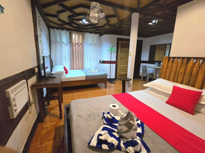 Standard Quadruple Family room with balcony and with garden view