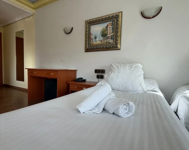 Standard Quadruple room with balcony and with city view