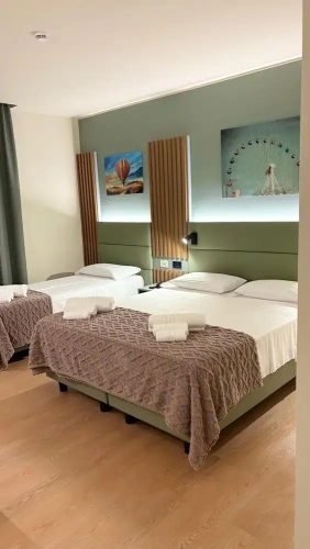 Deluxe Triple room with balcony and with city view