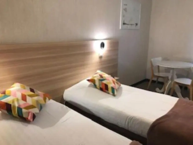 Standard Twin room with garden view