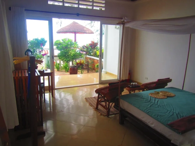 Standard room with balcony and beachfront