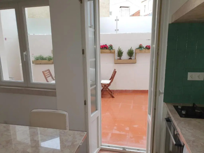 7ti7 Telhal apartment with a lovely Backyard