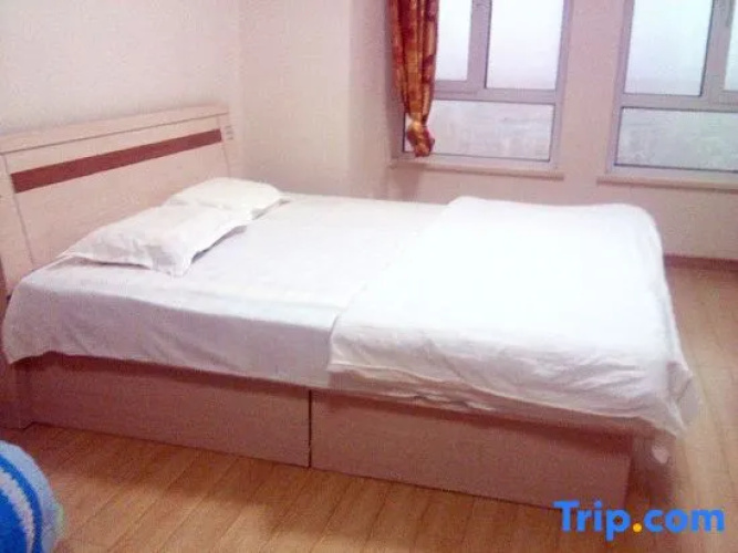 Xingfu Apartment Hotel