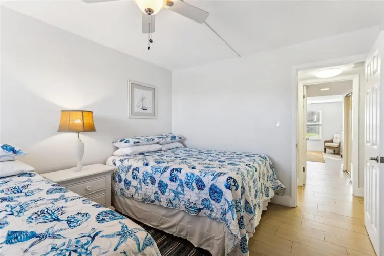 Beachfront Gem: Serene 2BD Haven With Pool & Views