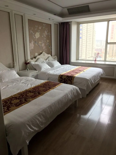 Dalian Xuanya Apartment