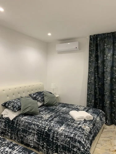Standard Quadruple room with balcony and with city view