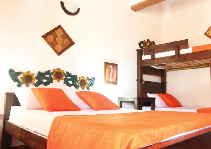 Standard Quadruple room with garden view
