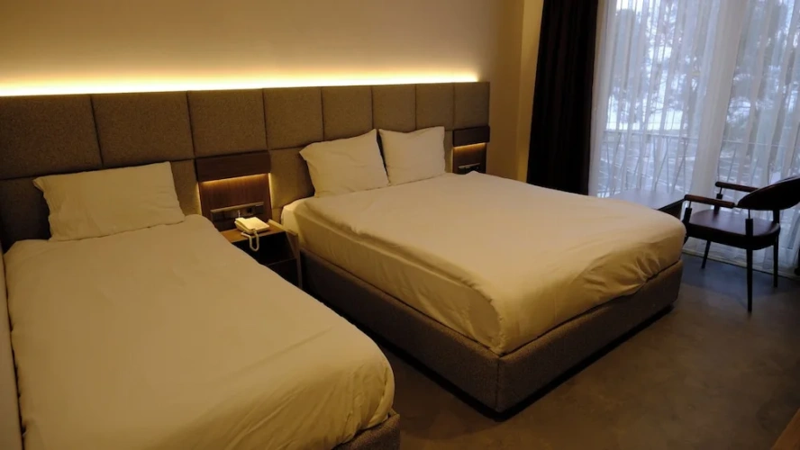 Deluxe Triple room with balcony