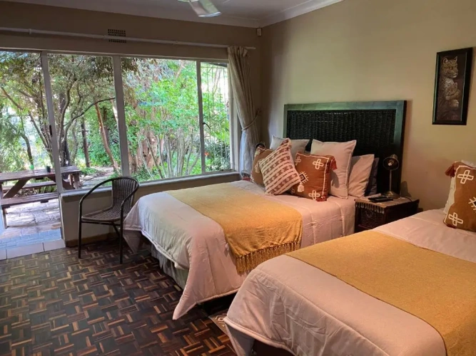 Standard Triple room with garden view