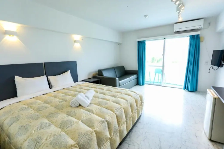 Standard Quadruple room with balcony and with sea view
