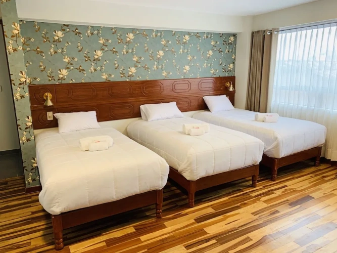 Superior Triple room with garden view