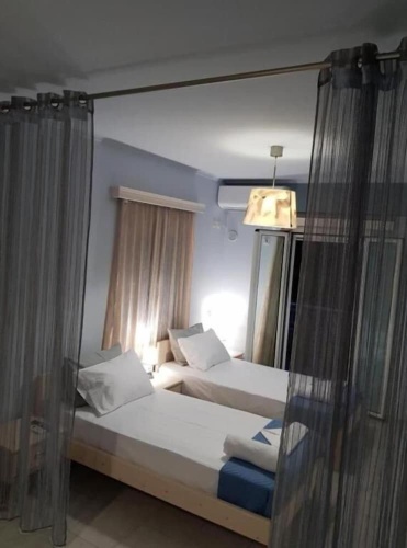 Standard Quadruple room with balcony and with courtyard view
