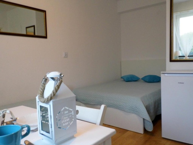 Standard Triple room with garden view