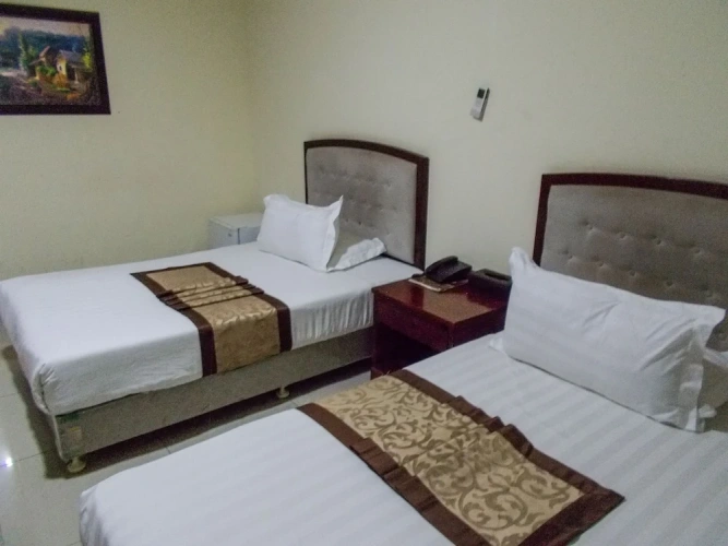 Standard Twin room with garden view