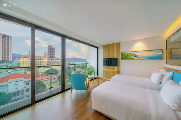 Deluxe Twin room with partial ocean view