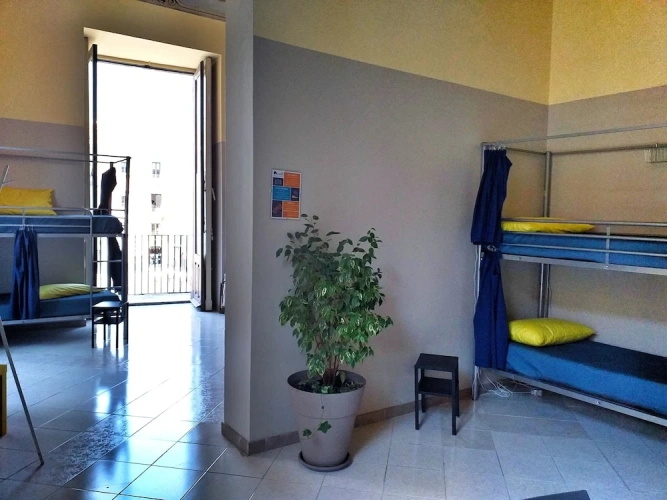 Bed in Dorm (female dorm) with balcony
