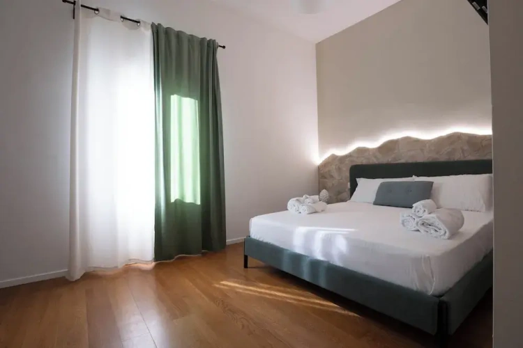 Deluxe Quadruple room with balcony and with city view