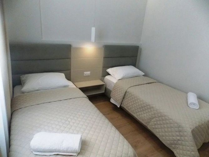 Standard Quadruple room with balcony and with partial sea view