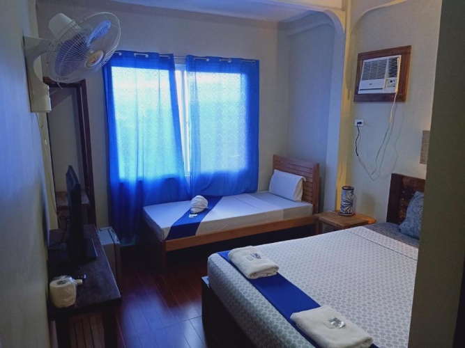 Standard Triple room with sea view