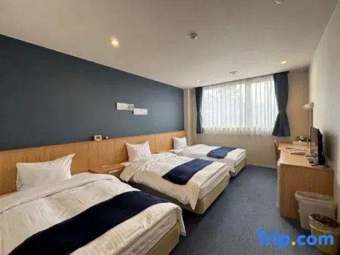 Standard Triple room with garden view