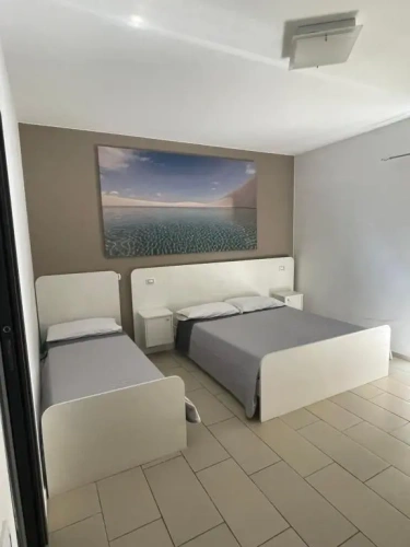 Standard Triple room with garden view