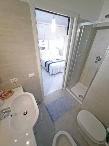 Standard Triple room with balcony and with sea view