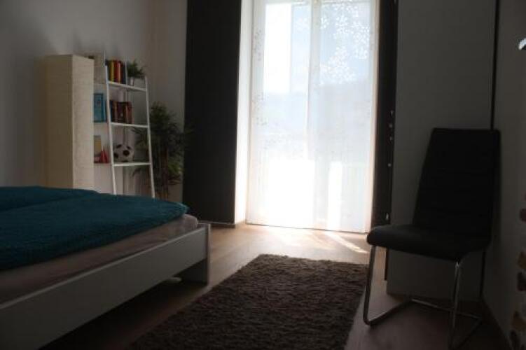 Apartment pool and lakeOver view