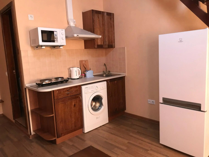 Two-floor apartments and studio 2-х этажные апартаменты и студия в самом центре