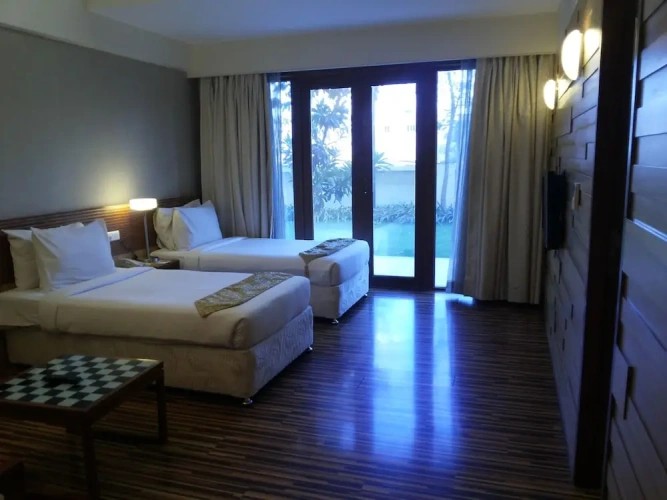 Standard Quadruple room with garden view