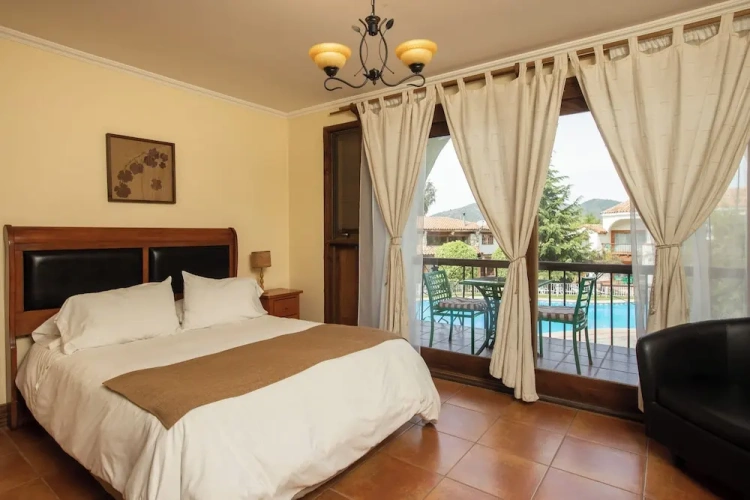 Standard Quadruple room with balcony and with pool view