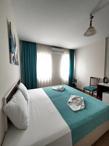 Standard Triple room with balcony and with city view