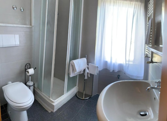 Standard Quadruple room with garden view