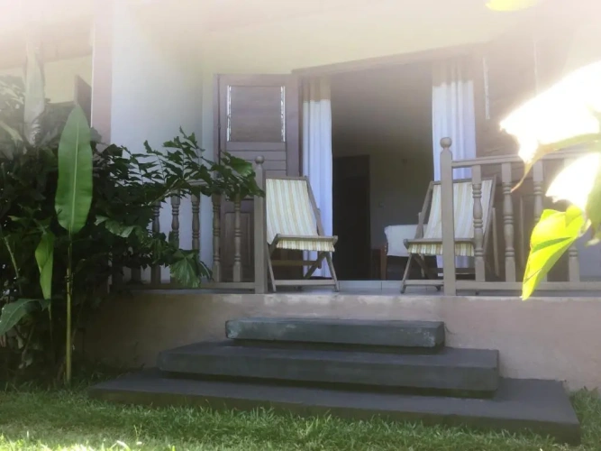 Standard Triple room with garden view