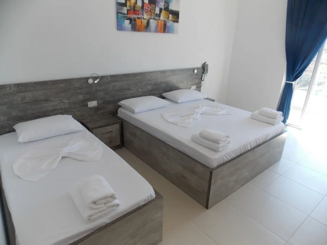 Standard Triple room with sea view