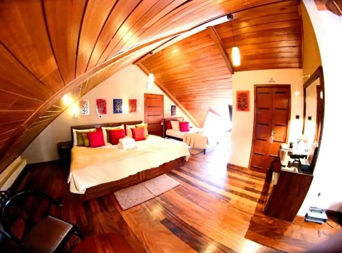 Standard Quadruple room with balcony and with garden view