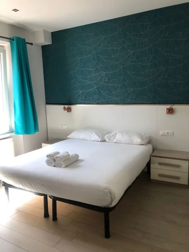 Standard Triple room with balcony and with courtyard view