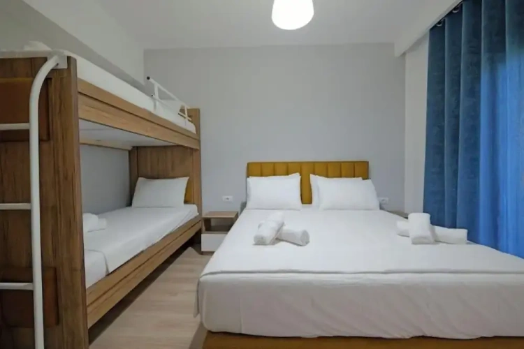 Standard Quadruple room with balcony and with garden view