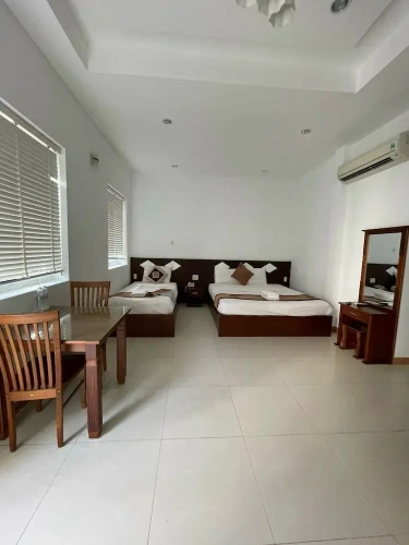 Deluxe Triple room with balcony and with garden view