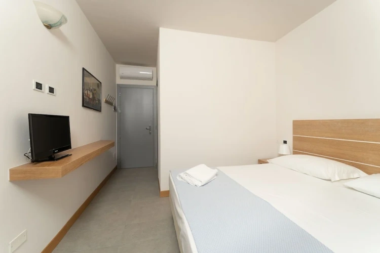 Classic Triple room with balcony and beachfront