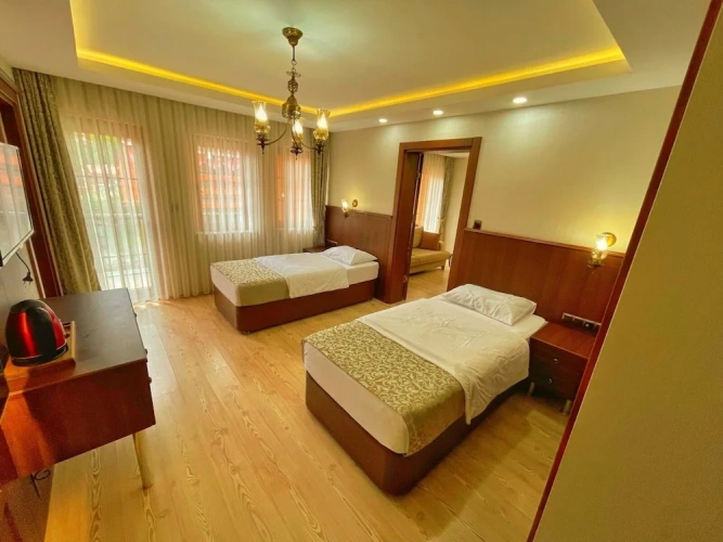 Deluxe Quadruple Duplex room with balcony