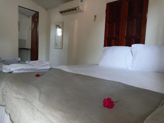 Canoa Hostel e Suites