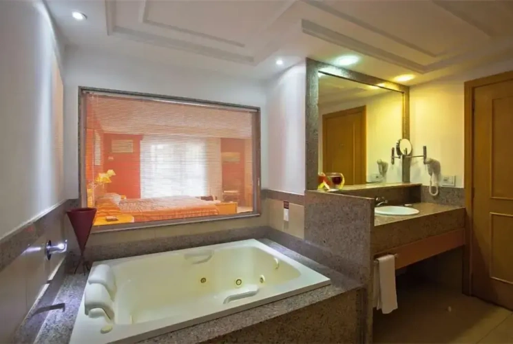 Executive Triple Suite with balcony and with pool view